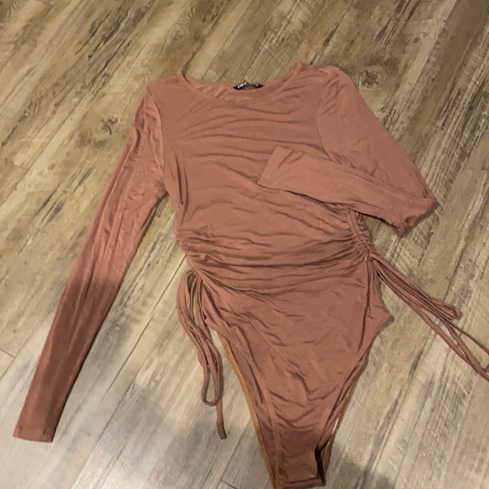 Brown body suit